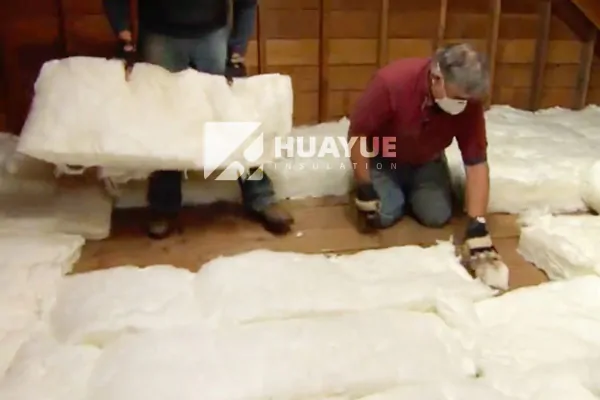 inspecting attic insulation