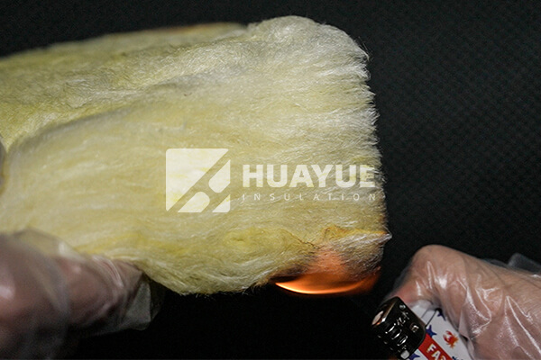 A sample of fiberglass insulation showing its fibrous texture