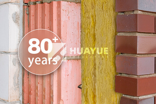 A cutaway of a wall showing pristine insulation that has been in place for decades