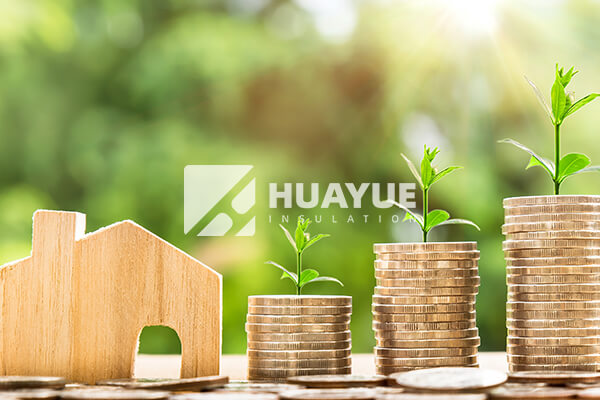 A piggy bank with a graph showing rising energy savings after an insulation upgrade