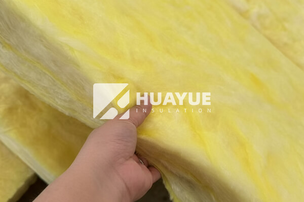 Up-close of pink fiberglass batts