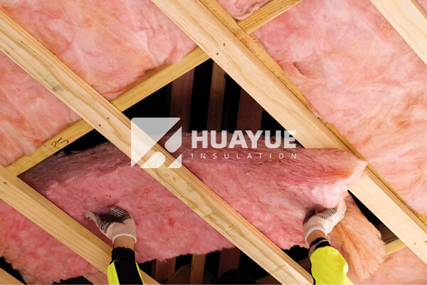 Fiberglass insulation installed between attic joists