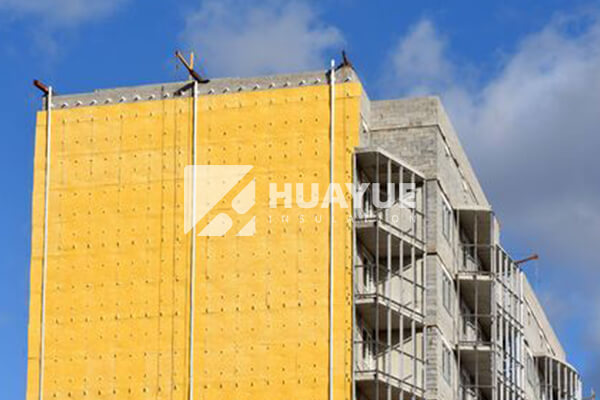 Rock wool installation on exterior wall