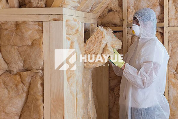 fiberglass insulation installed in wall cavity