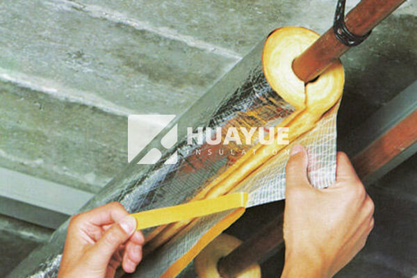 fiberglass insulation installed outdoors on pipelines