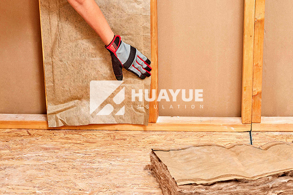 fiberglass insulation with paper facing, showing correct orientation in wall cavity