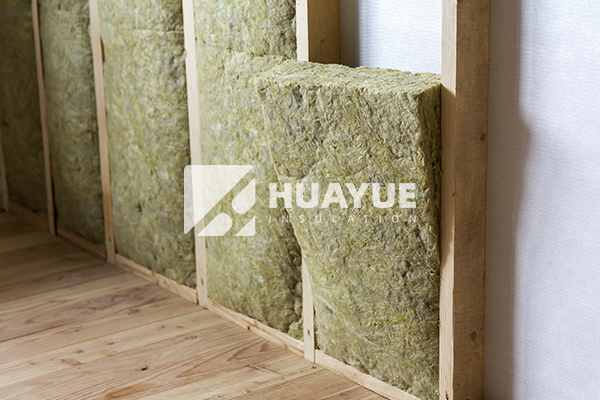 rockwool insulation installation in stud wall