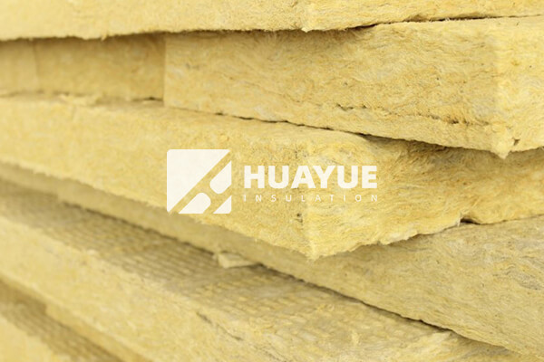 thick rockwool batts stacked in warehouse