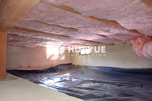 fiberglass insulation installation scene