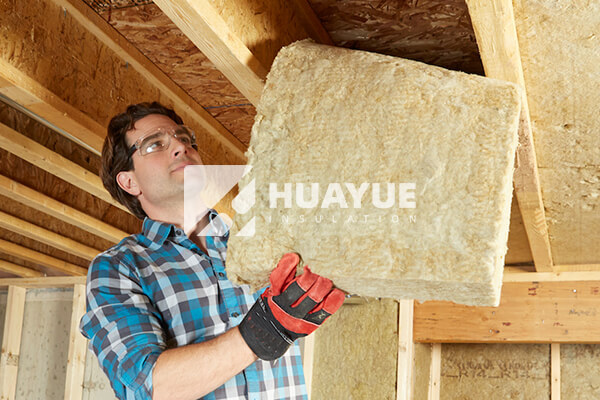 placing support wires for rock wool insulation