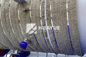 rockwool insulation installation on industrial tanks and pipes