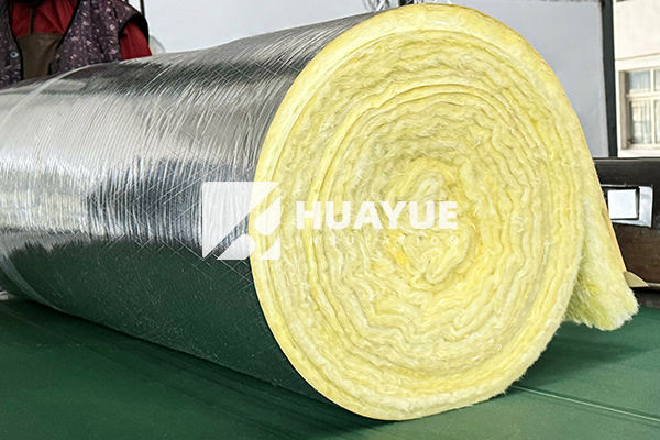 Aluminium foil glass wool insulation product rolls in warehouse