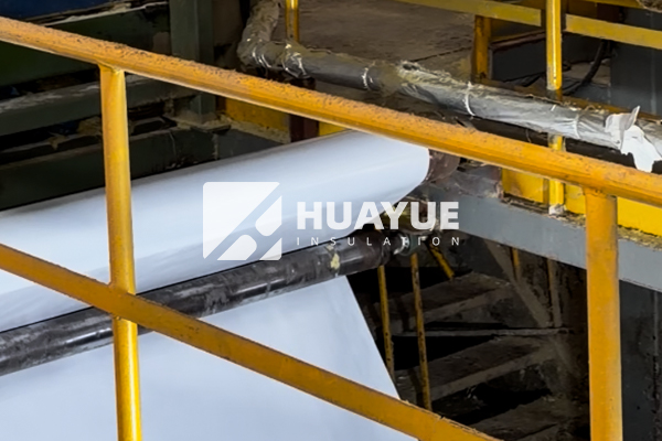 Fiberglass insulation manufacturing line, showing products with and without vinyl facing