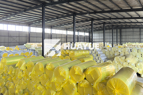 fiberglass insulation rolls in warehouse