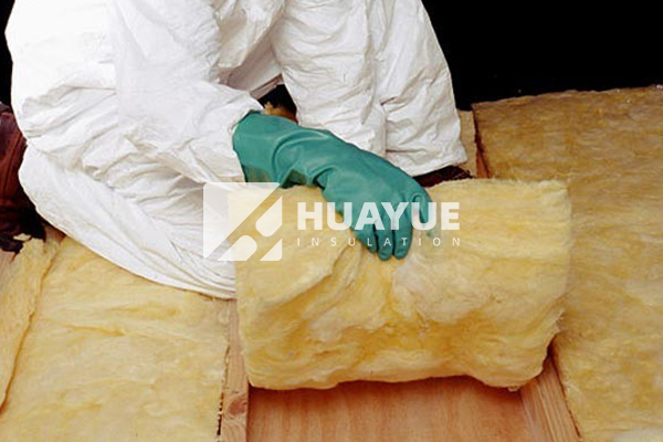 Installing floor insulation batts