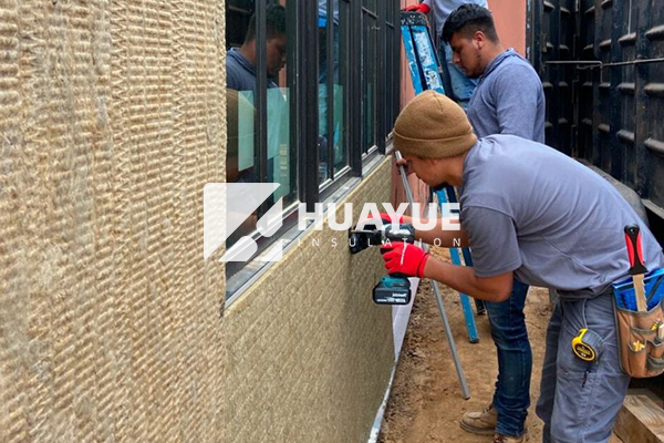 Rock wool insulation installed on building facade
