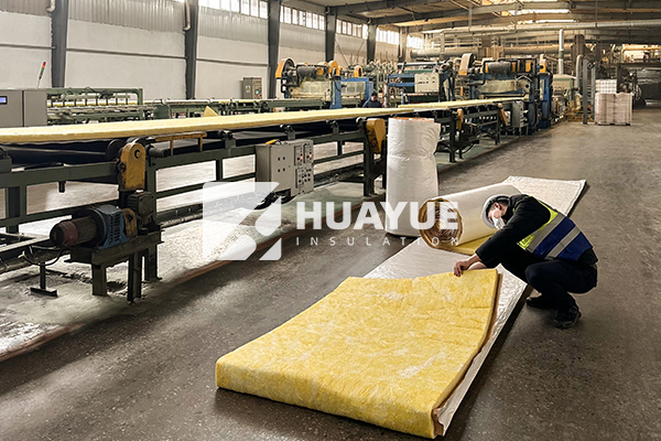 vinyl faced batt insulation product