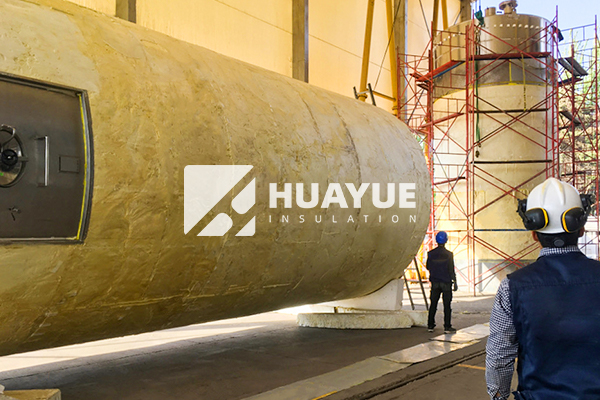 Rock wool board installed on high-temperature steel pipe at 400°C chemical plant, showing 100 mm thickness