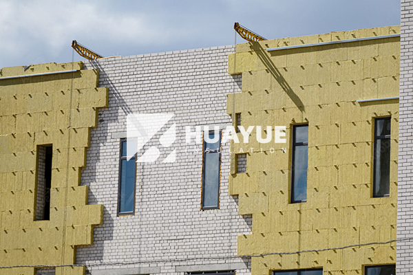 rock wool insulation installed in commercial wall rock wool insulation application image