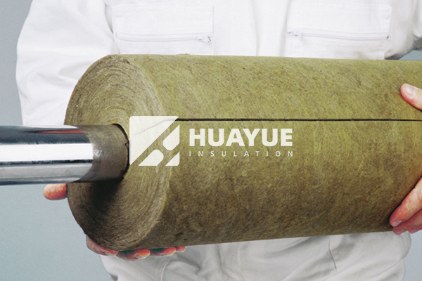Rock wool pipe section, 24 inch diameter, fitted around process pipe in a chemical plant