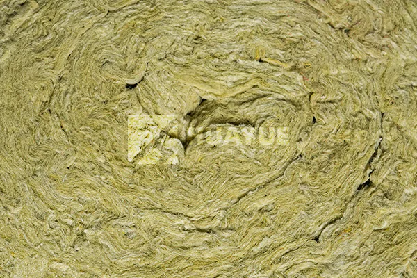 Rock wool acoustic layer within a floor-ceiling build-up