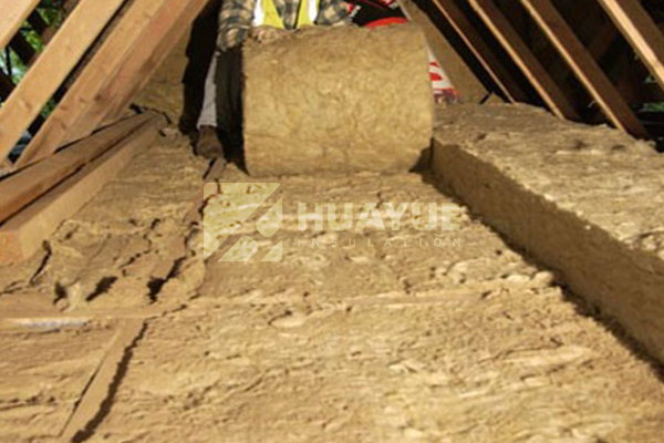 rock wool roll installed across a continuous building surface