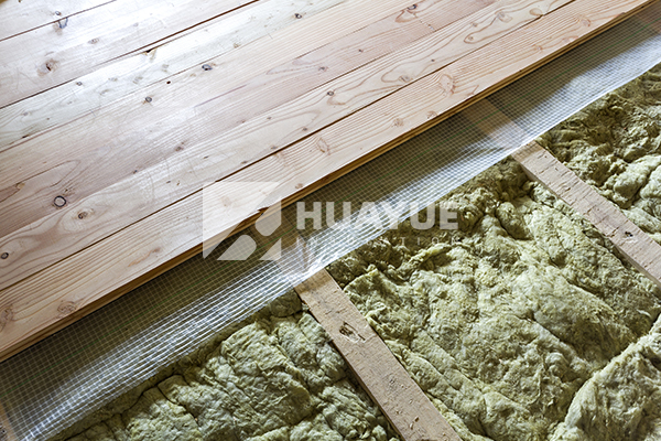 rock wool batts installed between floor joists